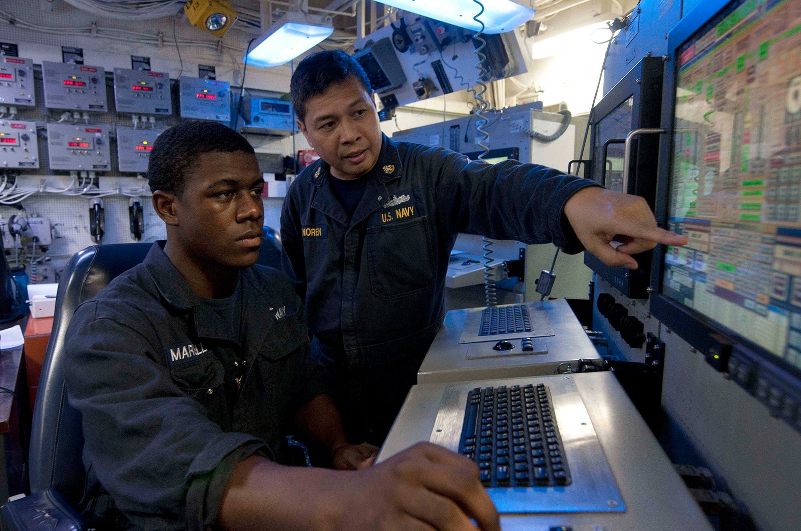 Chelvis “CJ” Marshall conducting electrical load transfer training aboard USS Hue City.